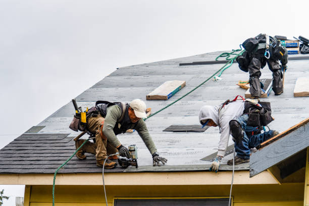 Professional Gutter Installation technician working in Winnetka, CA